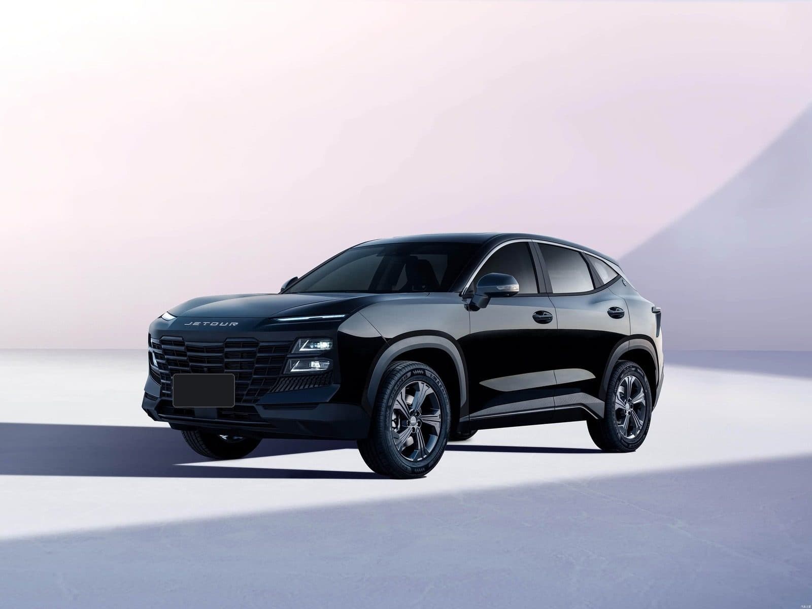 2026 Jetour Dashing RHD compact SUV in black, front three-quarter studio photo