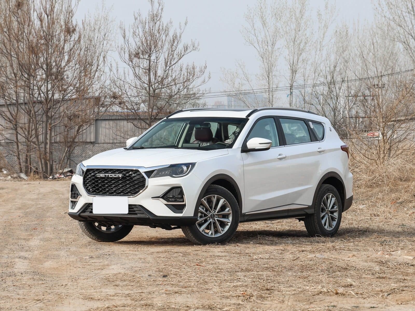 2026 Jetour X70 RHD in white, front three-quarter view — 7-seat family SUV for export